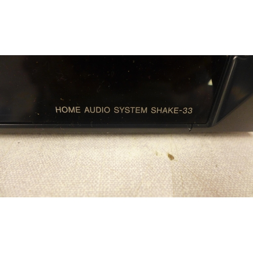 5080 - A Sony model no HCD-Shake33 compact disc receiver/home audio system with a pair of SS-Shake33 speake... 