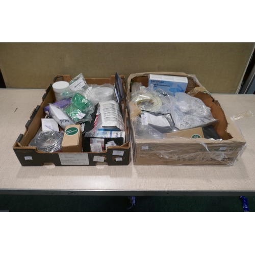 6428 - Two boxes of miscellaneous items including seam sealer, waterproof cast protector, shower hose, glov... 