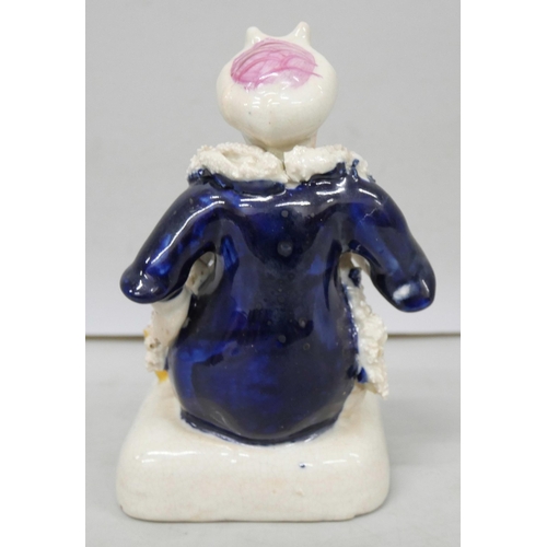 2024 - A 19th Century style Staffordshire pen holder figure in the form of a seated Turk, 13cms h