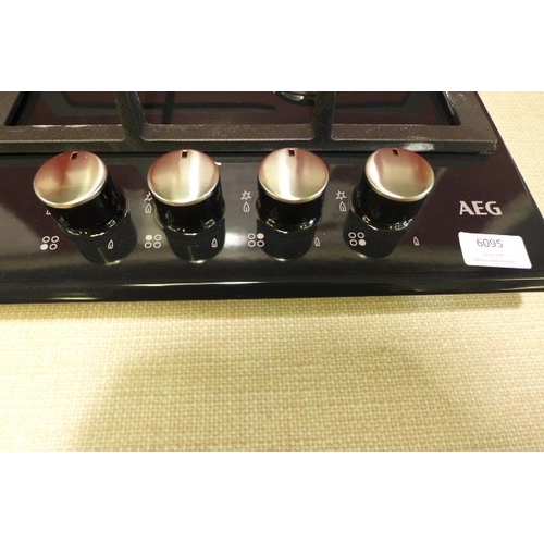 6095 - AEG 4 zone gas hob (507-1) *This lot is subject to VAT