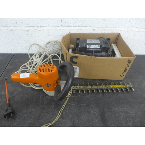 5184 - A Black and Decker DNJ450G mini electric hedge trimmer and a Turbo boast MK2 shower pump - in a box