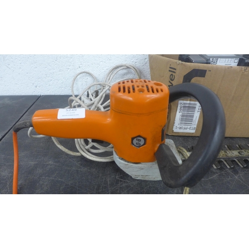 5184 - A Black and Decker DNJ450G mini electric hedge trimmer and a Turbo boast MK2 shower pump - in a box