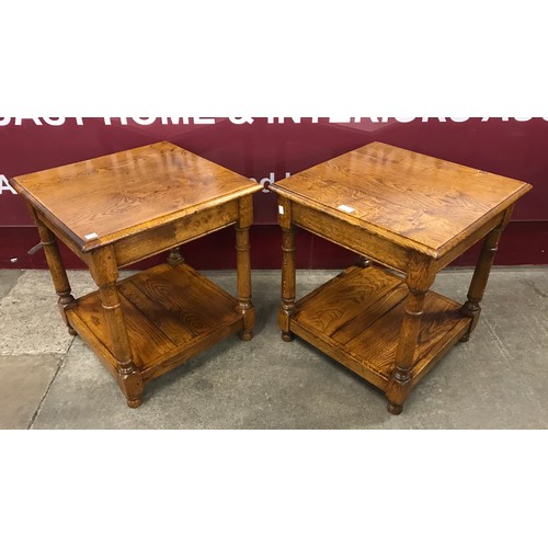 164 - A pair of George III style Ipswich oak lamp tables