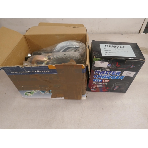 5334 - A boxed XH-BC04 12v master charger and a lever hoist with wire rope *This lot is subject to VAT