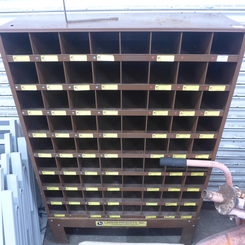 A Lamson products 72 section pigeon hole unit