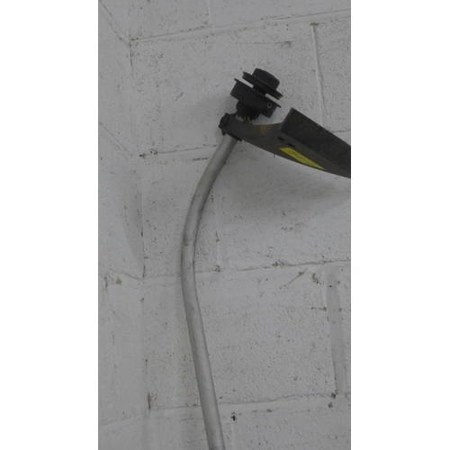 5186 - A Sovereign petrol strimmer with additional strimmer attachment