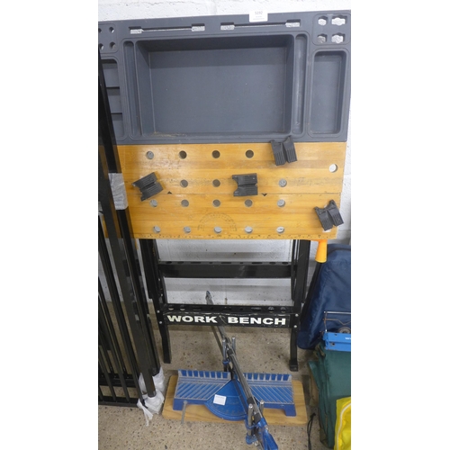 5192 - A manual mitre saw and a folding work bench with tool tray
