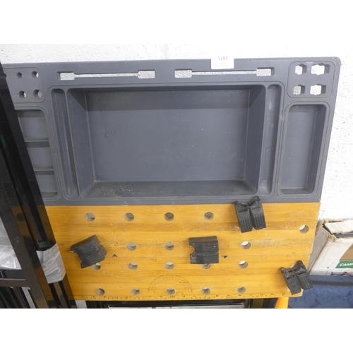 5192 - A manual mitre saw and a folding work bench with tool tray