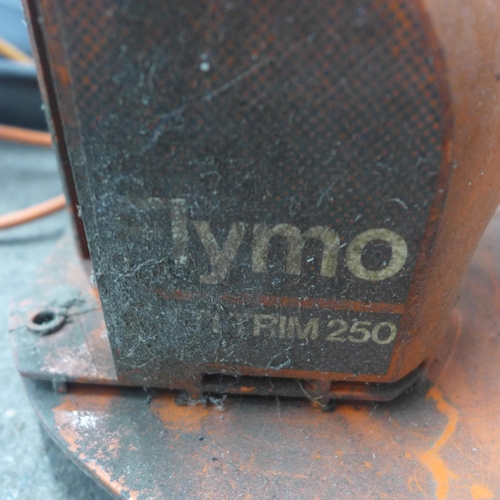5212 - Three electric garden tools - a Flymo Easi Glide 330VX, a VMB GHT-450-B, 240V hedge trimmer and a Fl... 