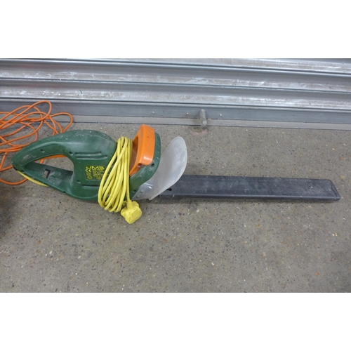 5212 - Three electric garden tools - a Flymo Easi Glide 330VX, a VMB GHT-450-B, 240V hedge trimmer and a Fl... 