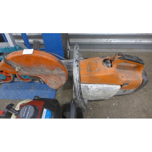 5214 - A petrol stone cutting saw, a Kawasaki KHT600S petrol hedge trimmer and 2 sack trucks