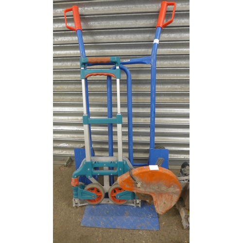 5214 - A petrol stone cutting saw, a Kawasaki KHT600S petrol hedge trimmer and 2 sack trucks
