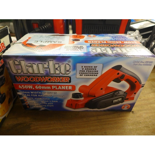 5295 - Four boxed Clarke items including a 6 amp battery charger, a 125w palm sander, a 200w 1/3 sheet orbi... 