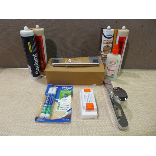 6148 - A box of miscellanous items to include sealant, door handles, grout pens, food thermometer, etc.  * ... 