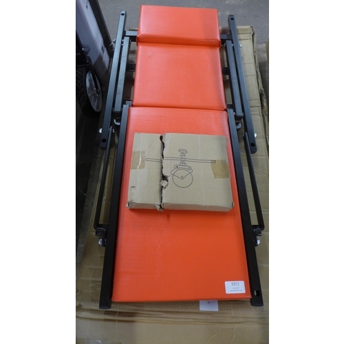 5311 - A boxed creeper trolley *This lot is subject to VAT