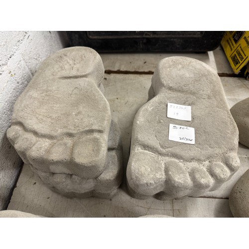Three pairs of stone foot stepping stones