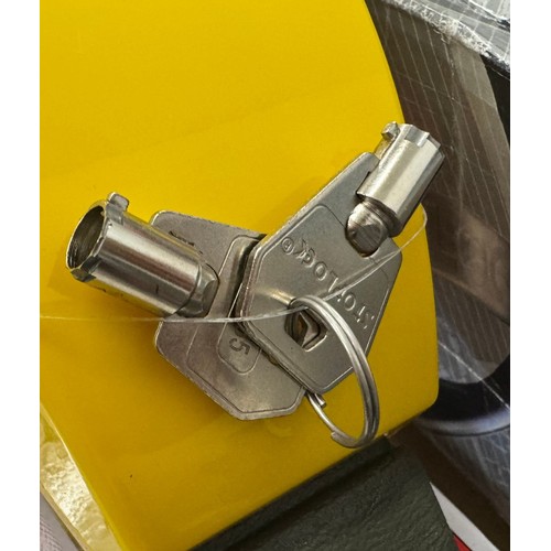 A Stoplock steering wheel immobiliser with keys and a Maypole 13