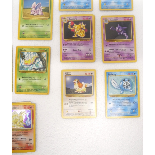8001 - Thirty Nine base set Pokémon cards including Pikachu (581102), Charmander (146/102), Charmeleon (24/... 