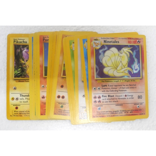 8001 - Thirty Nine base set Pokémon cards including Pikachu (581102), Charmander (146/102), Charmeleon (24/... 