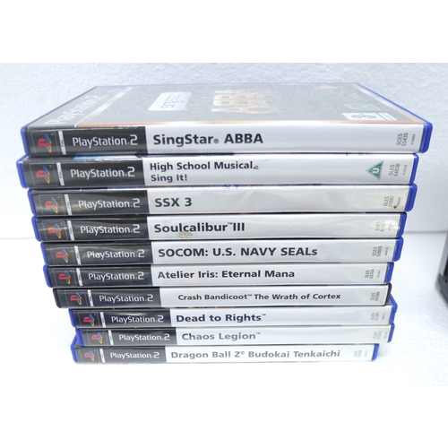 8034 - A limited edition silver PlayStation 2 with 14 boxed PlayStation 2 games