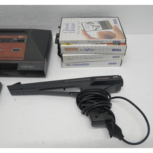 8041 - A Sega Master System/Power Base games console with power supply, control pad, aerial cable, light ph... 