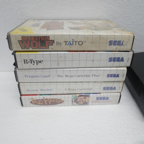 8041 - A Sega Master System/Power Base games console with power supply, control pad, aerial cable, light ph... 