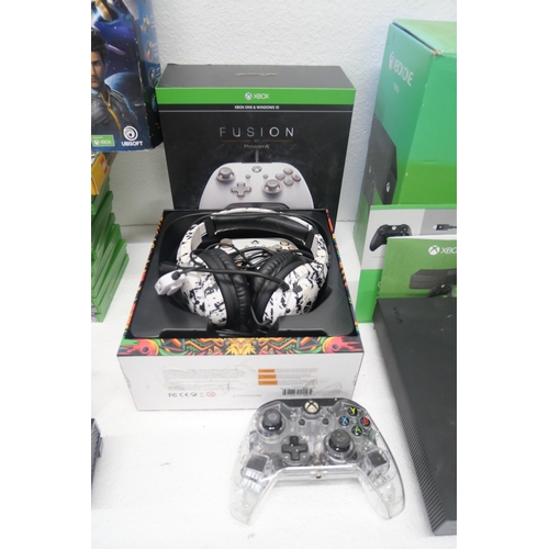 8050 - A large quantity of Xbox items including, a Project Scorpio Xbox One X in an Xbox One box with third... 