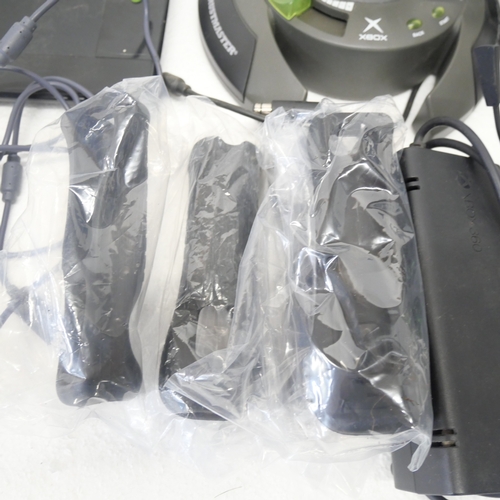 8053 - A quantity of gaming peripherals including, a Sega Saturn MK-80304 racing wheel, an Xbox Thrustmaste... 