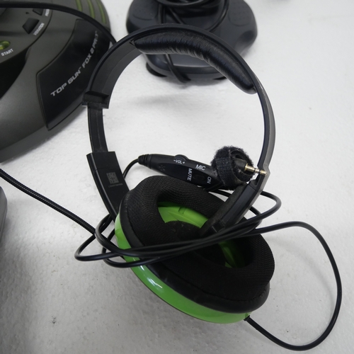 8053 - A quantity of gaming peripherals including, a Sega Saturn MK-80304 racing wheel, an Xbox Thrustmaste... 