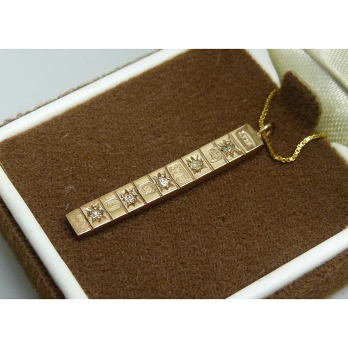 7001 - A 9ct gold ingot pendant set with diamonds, on a 9ct gold necklace chain, 2.2g total, pendant 3cm