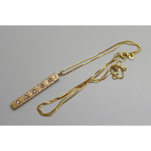 7001 - A 9ct gold ingot pendant set with diamonds, on a 9ct gold necklace chain, 2.2g total, pendant 3cm
