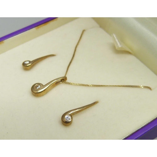 7005 - A yellow metal and white stone matching pendant and earrings set, chain marked 375, 2.5g total weigh... 