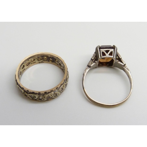 7013 - A 9ct gold, silver and white stone ring, M, and a 9ct gold and silver ring, L/M, 5.3g total weight