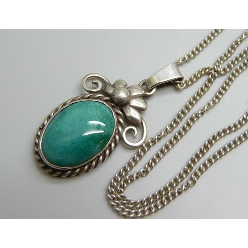 7018 - A white metal floral pendant, and a pair of turquoise set silver earrings, pendant 4cm including bal... 