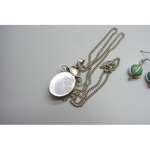7018 - A white metal floral pendant, and a pair of turquoise set silver earrings, pendant 4cm including bal... 