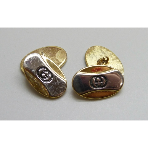 7019 - A pair of Gucci gold plated cufflinks, boxed