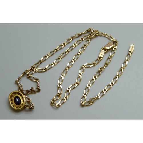 7023 - A 9ct gold curb link necklace with a sapphire and diamond cluster, 4.6g, 39cm