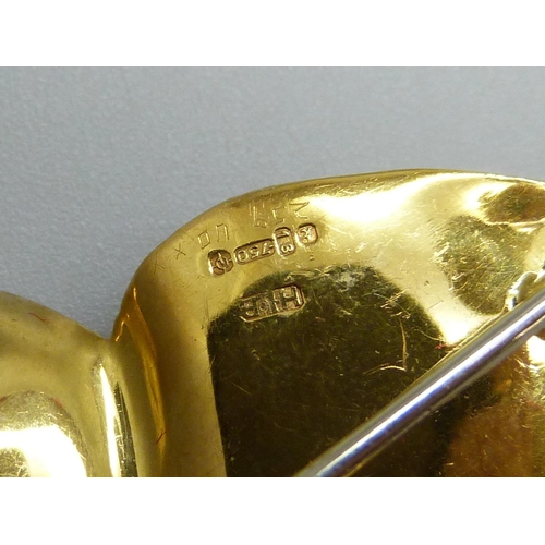 7026 - An 18ct gold brooch in the form of a leaf, set with a diamond, 8.2g, 5.2cm