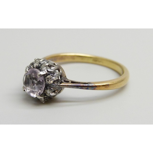 7029 - An 18ct gold, amethyst and diamond cluster ring, 1.9g, I