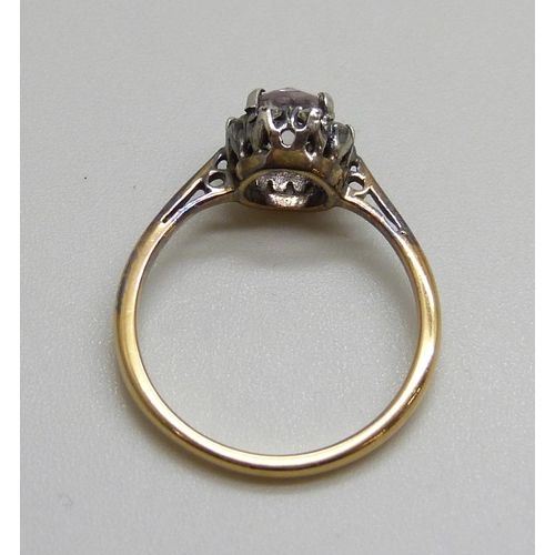 7029 - An 18ct gold, amethyst and diamond cluster ring, 1.9g, I