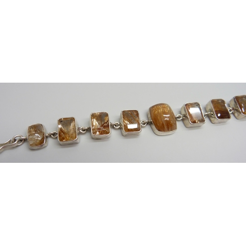 7036 - An 80ct silver and Brazilian quartz bracelet, 20cm, 35g