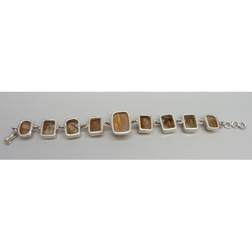 7036 - An 80ct silver and Brazilian quartz bracelet, 20cm, 35g