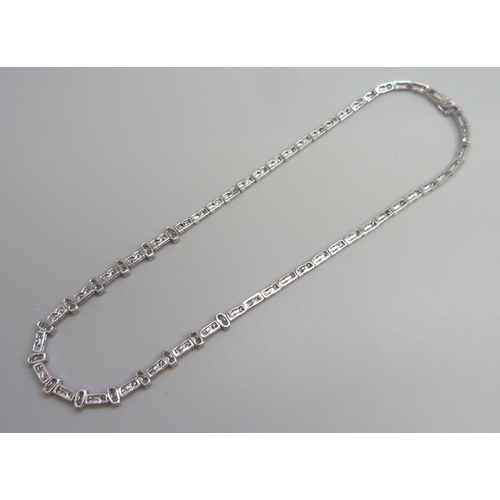 7044 - A hallmarked silver tennis necklace set with white stones, 21g, 40.5cm