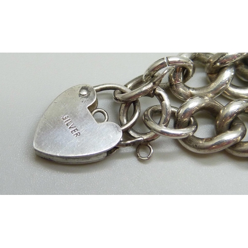 7048 - A silver heavy curb link bracelet, 40g
