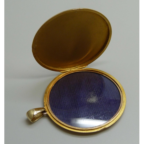 7050A - A 15ct gold locket, 17.4g, 5cm including bale