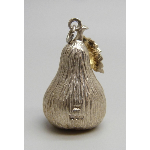 7051 - A hallmarked silver pendant in the form of a pear, London, 1977, 10g (not hollow), 3cm including bal... 