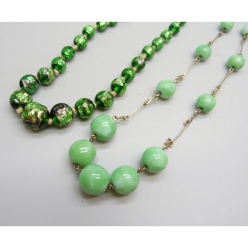 7059 - Vintage Art Deco bead necklaces, a green stone example, and a foiled glass example (some links chipp... 