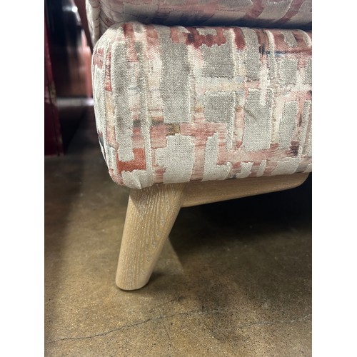 3003 - A velvet patterned footstool