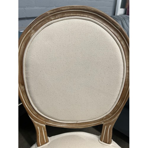 3010 - A cream fabric upholstered occasional chair