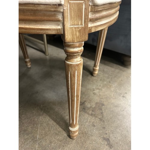 3010 - A cream fabric upholstered occasional chair